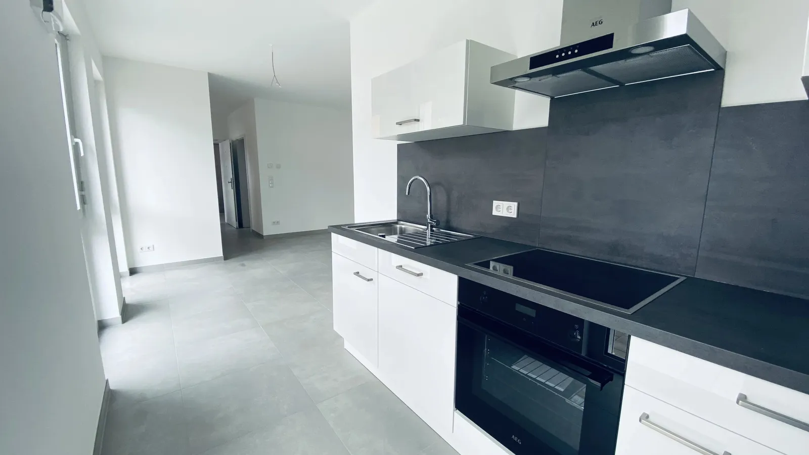Kapitalanlage mit Zukunft: Moderne 2-Zimmer-Wohnung mit Terrasse, Garten & optionalem Stellplatz in Tawern