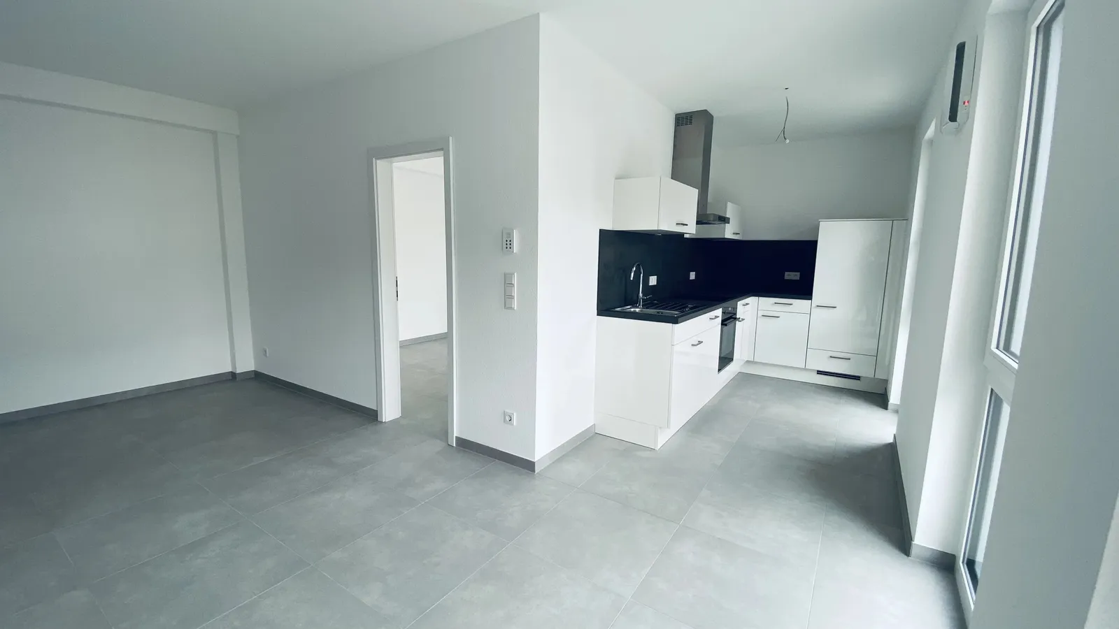 Kapitalanlage mit Zukunft: Moderne 2-Zimmer-Wohnung mit Terrasse, Garten & optionalem Stellplatz in Tawern